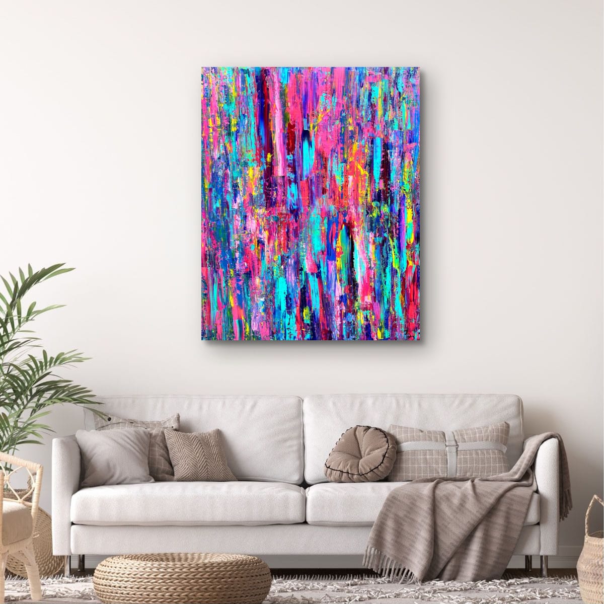 WHEN DID THIS BECOME OK hung above a cream sofa in a bright, minimal living room