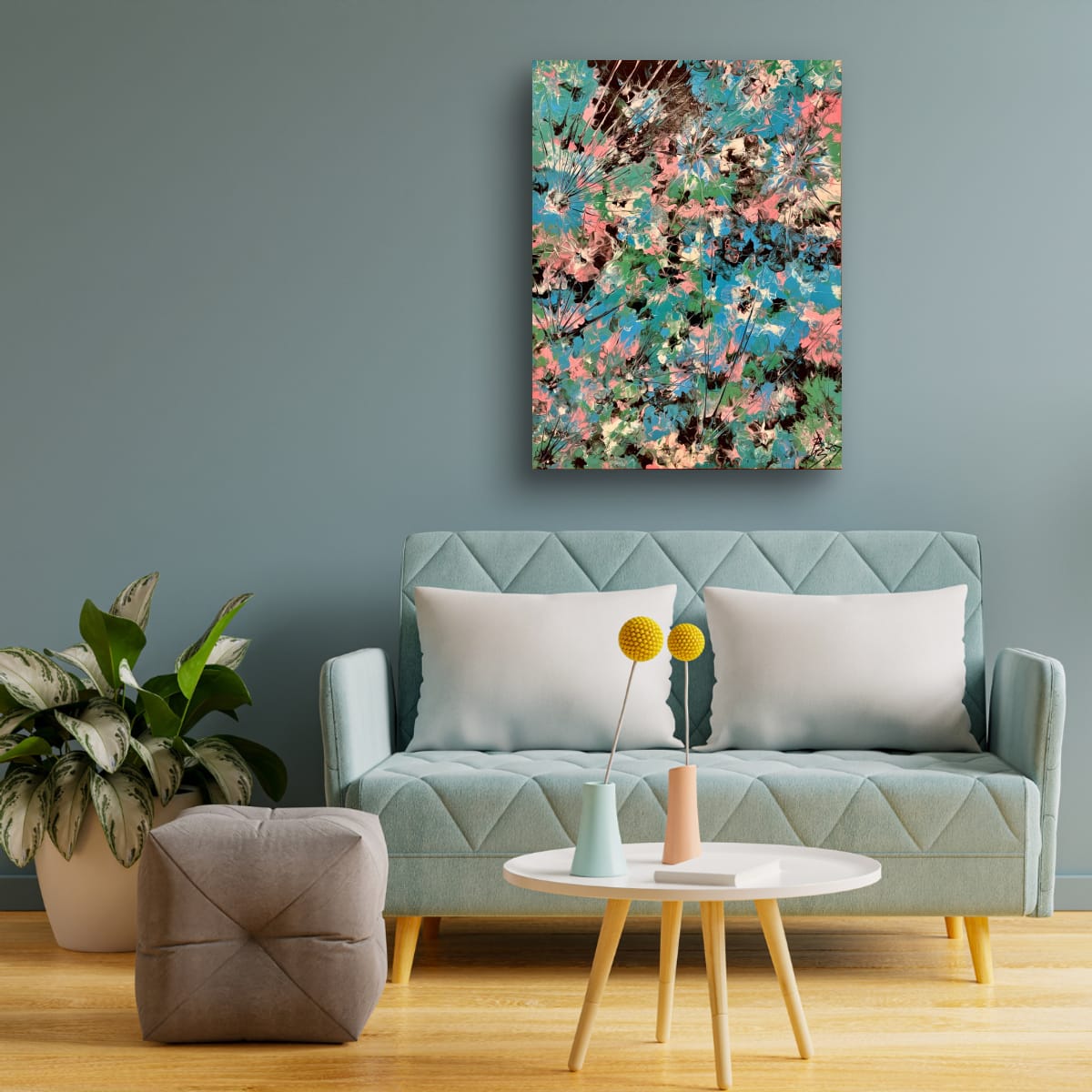 MIAMI OR DIE hung on a soft blue grey wall above a mint sofa with white cushions and a round white coffee table